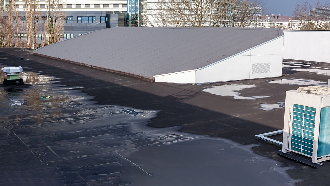 Beyond Leaks: Why Ponding Water Is Bad for Your Commercial Roof