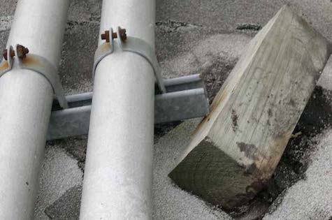 4 Reasons to Stop Using Wood for Rooftop Pipe & Equipment Supports